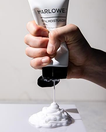 MARLOWE. Facial Moisturizer being squeezed by hand. Text: Not Your Father's Skincare